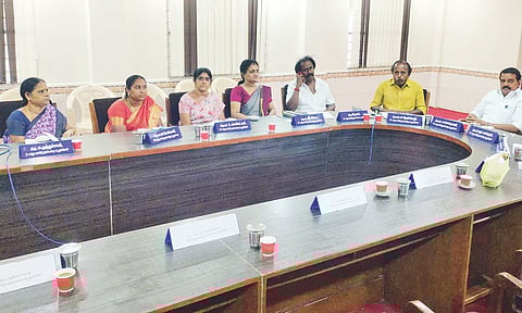 DMK members stage sit-in protest against chairperson in the Pattukottai council hall on Wednesday