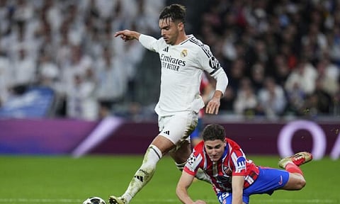 Real beats Atletico 2-1 in Champions League derby, Arsenal romps to record away win at PSV