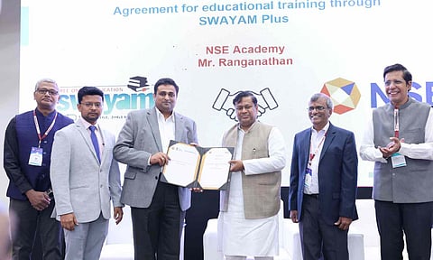 Dr Sukanta Majumdar displays MoU signed with NSE Academy during IInvenTiv 2025 at IIT Madras