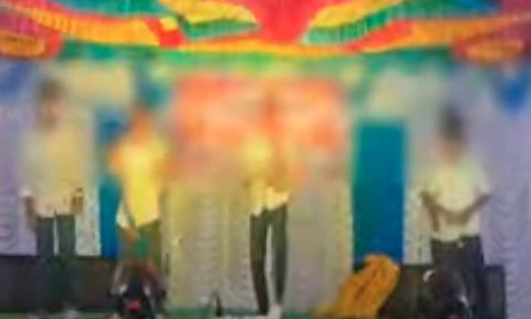 Dance performance staged by a group of students sporting PMK