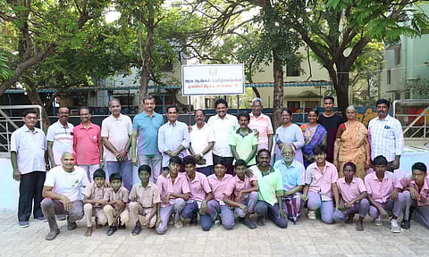 A few members from the team and Vijayakumar with the students of the school (Manivasagan N)