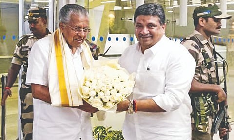 Kerala CM Pinarayi Vijayan being received by P Thiaga Rajan