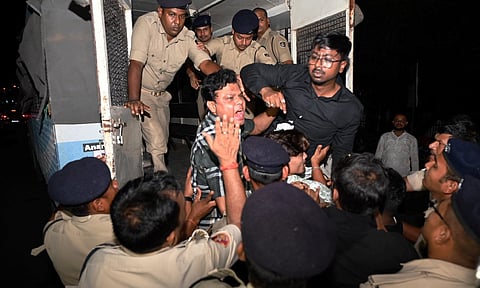Police detain Congress leaders and Youth Congress workers who were trying to enter inside the State Assembly in protest against suspension of 12 Congress MLAs, in Bhubaneswar (PTI)&nbsp;