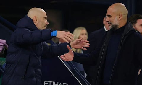 Enzo Maresca (left) and Pep Guardiola&nbsp;