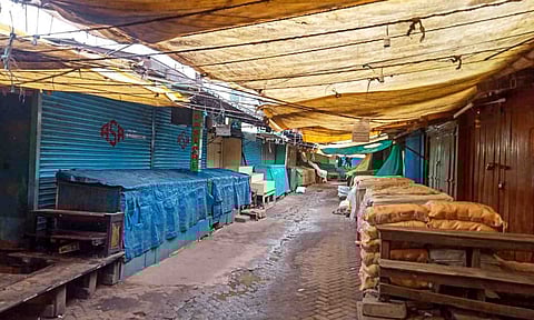 Closed shops at a market as part of a protest against the e-pass system implemented in line with a court verdict to keep the movement of vehicles under check, at Ooty, in Nilgiris district (PTI)