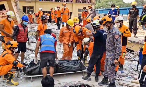 &nbsp;NDRF personnel conduct a rescue operation at the U Hla Thein Buddhist monastery following the recent earthquake, in Mandalay, Myanmar (PTI)