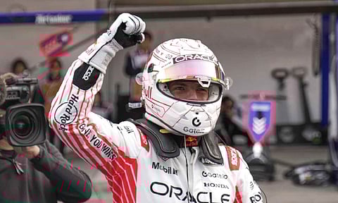 Red Bull driver Max Verstappen of the Netherlands celebrates after the qualifying session for the Japanese Formula One Grand Prix (AP)