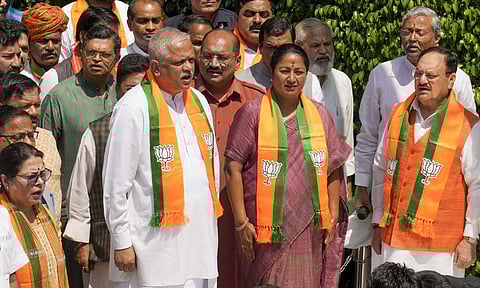 Union Minister and BJP National President JP Nadda, Delhi Chief Minister Rekha Gupta during the hoisting of the party's flag at an event on the occasion of the party's foundation day, at the party's headquarters, in New Delhi (PTI)&nbsp;