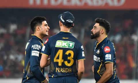Gujarat Titans' captain Shubman Gill with teammates Prasidh Krishna and Mohammed Siraj during the Indian Premier League (IPL) 2025 (PTI)