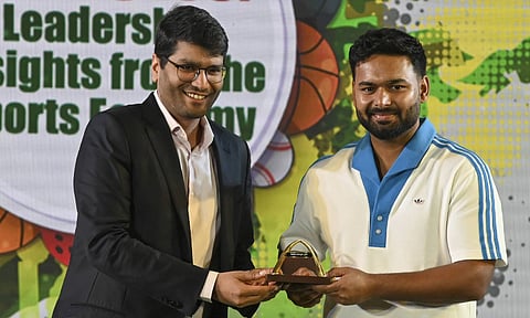 Confederation of Indian Industry (CII) Eastern Region Chairman and RP-Sanjiv Goenka Group Vice Chairman Shashwat Goenka with Indian cricketer Rishabh Pant during the 'India@100: Leadership Insight from the Sports Economy' event (PTI)&nbsp;