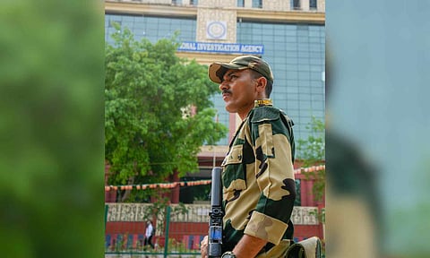 &nbsp;A security personnel guards outside the National Investigation Agency headauarters in New Delhi (PTI)