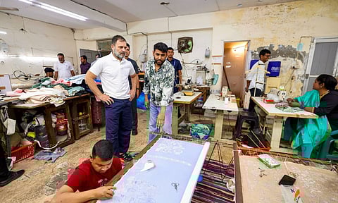 Leader of Opposition in the Lok Sabha Rahul Gandhi meets young textile designers. (PTI)