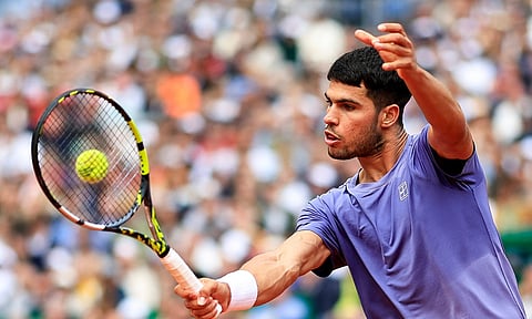 Carlos Alcaraz hits a backhand return&nbsp;