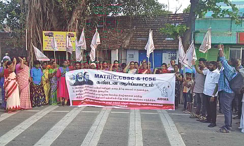 Members of AIDWA and CPM protesting against the school that made a menstruating girl write exam outside the classroom