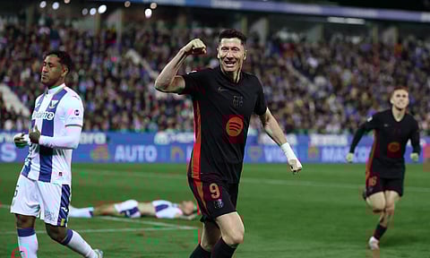 Robert  Lewandowski celebrates after the goal
