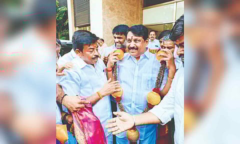 BJP state president Nainar Nagenthran getting a reception at the Thoothukudi airport on Monday