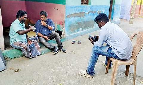 Filmmakers interacting with people for recording the documentary at Vengaivayal (File image)