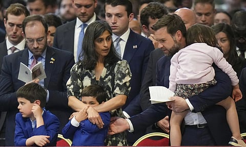 U.S. Vice President JD Vance, and his wife Usha Vance, with their daughter Mirabel, back to camera, and sons Vivek and Ewan, left, attend a Good Friday service inside St. Peter's Basilica at the Vatican (AP)