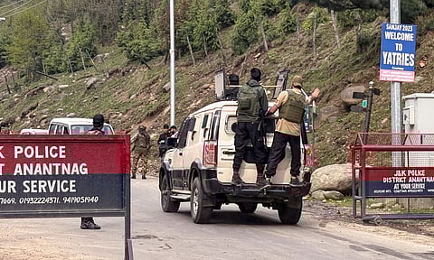Security personnel move towards the site after terrorists attacked a group of tourists at Pahalgam, in Anantnag district, Jammu &amp; Kashmir (PTI)