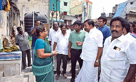 Minister KN Nehru interacts with a resident of Ward 10 in Woraiyur on Saturday&nbsp;
