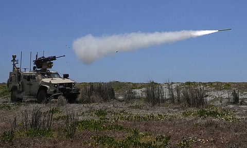 A U.S. Marine Air Defense Integrated System, or MADIS, fires at a drone during a live-fire joint Philippines-U.S. military exercise at the Philippine Navy training camp in San Antonio, Zambales province (AP)