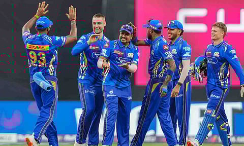 Mumbai Indians team players during the match (PTI)