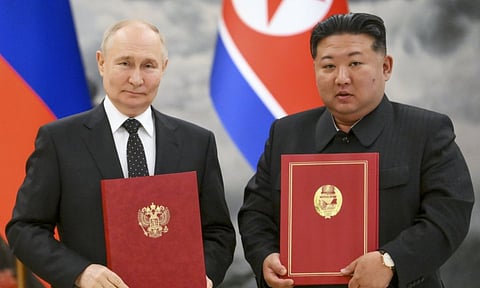 Vladimir Putin and Kim Jong-un (AP)