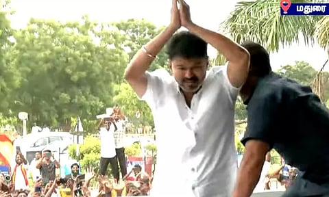 Tamilaga Vettri Kazhagam (TVK) president Vijay's pit stop in Madurai turned into an impromptu roadshow (Thanthi TV)