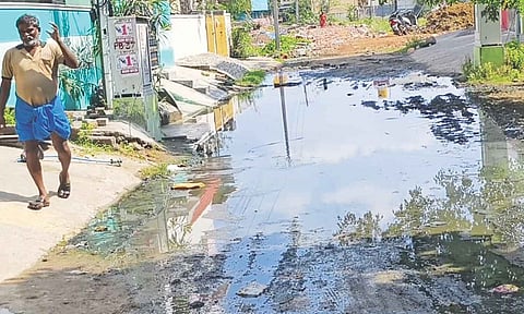 Sewage water inundates one of the streets in Thirumalai Nagar North extension