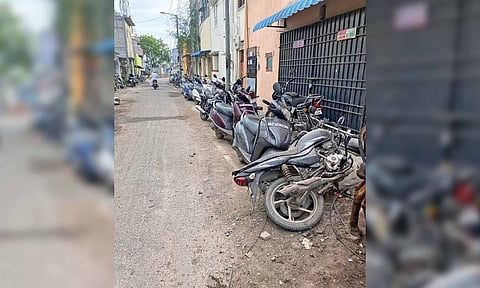 Two-wheelers encroaching upon the space on Vembull Amman Koil Street, Natco Calomy