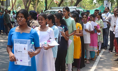 Hundreds of students standing outside the Asan Memorial Higher Secondary School, Thousand Lights, on Sunday