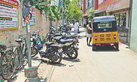 Two-wheelers take most of the space on Venkateshwara Lane in Choolaimedu