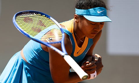 Naomi Osaka reacts after losing&nbsp;