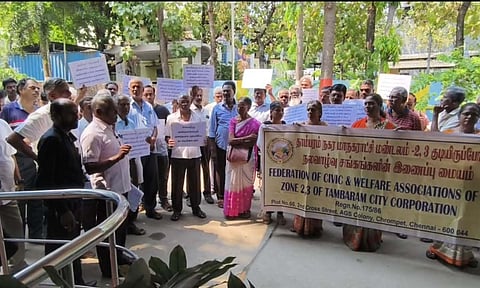 Residents protest outside Tambaram Corporation office on Monday&nbsp;