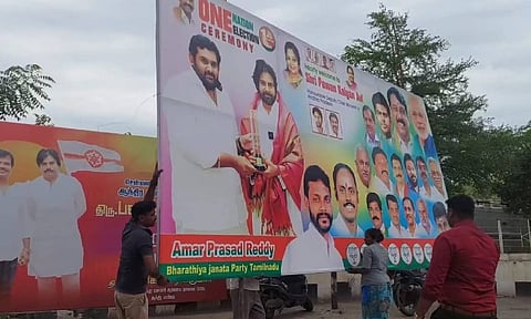 GCC officials removing banners that had been put up to greet Andhra Pradesh Deputy Chief Minister Pawan Kalyan&nbsp;
