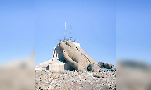 A destroyed statue of Hafez al-Assad.&nbsp;