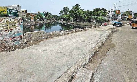 The parapet of the Otteri Nullah bridge has totally collapsed posing danger to pedestrians