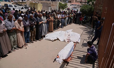 Israeli forces open fire a kilometer away from Gaza aid site, killing 3 (AP)