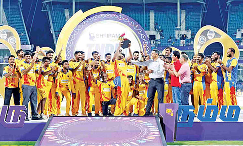 Dindigal Dragons players celebrating after winning the TNPL trophy in 2024