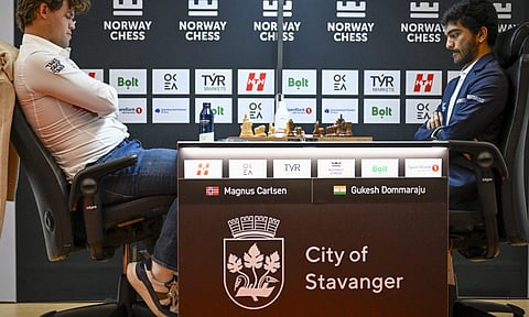 Magnus Carlsen and Gukesh during a game&nbsp;