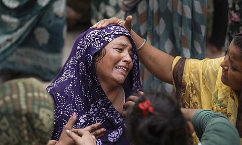 Relative of a victim of the Air India plane crash mourns at a hospital, in Ahmedabad, Friday, June 13, 2025. A London-bound Air India plane carrying 242 passengers crashed moments after taking off from the Ahmedabad airport on Thursday (PTI)&nbsp;