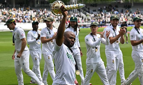 &nbsp;South Africa captain Temba Bavuma holds the Test Championship mace after his team's triumph