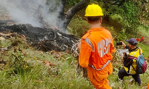 NDRF personnel at the spot after a helicopter crashed near the Kedarnath shrine, in Rudraprayag district, Uttarakhand (PTI)