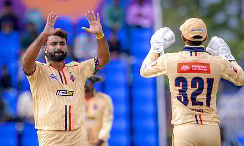Abhishek Tanwar celebrates after taking a wicket with N Jagadeesan&nbsp;