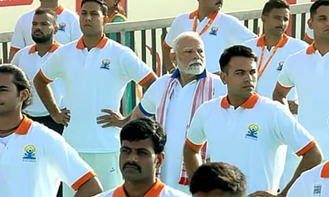 Prime Minister Narendra Modi takes part in a yoga session during 11th International Day of Yoga celebrations (PTI)