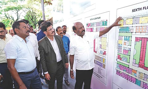 Health Minister Ma Subramanian and officials inspecting the plan for the Children’s Multi-Speciality hospital on Sunday&nbsp;