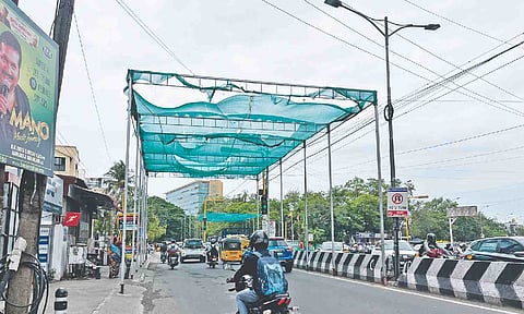 Damaged shade net on 100 Feet Road near Velachery junction poses danger to public
