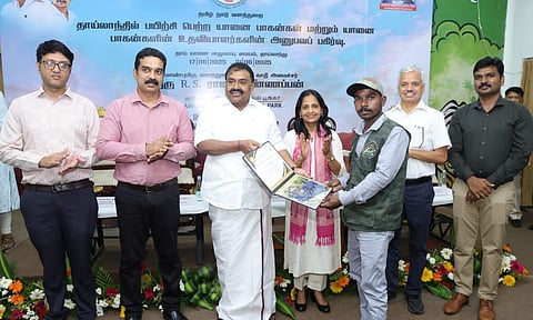 Minister Rajakannappan and officials with mahouts&nbsp;