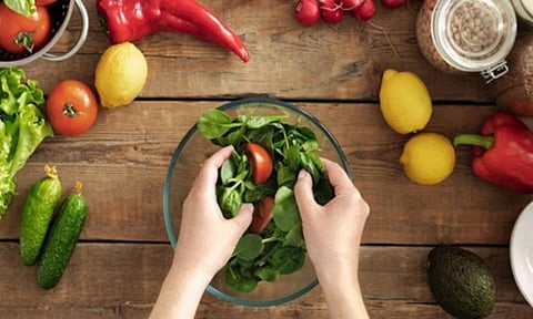 A bowl of spinach, kale and broccoli may boost heart health in elderly women