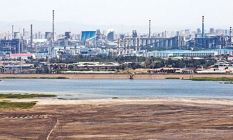 An artificial lake of sludge in Baotou, born of rare earth and iron ore processing waste